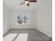 Bedroom with gray carpet and ceiling fan at 1420 Beechwood Dr, Gastonia, NC 28052