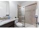 Bathroom with granite countertop, shower, and toilet at 14206 Morningate St, Huntersville, NC 28078