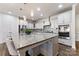 Spacious kitchen with granite countertops and stainless steel appliances at 14206 Morningate St, Huntersville, NC 28078