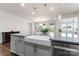 Kitchen with a farmhouse sink and granite countertops at 14206 Morningate St, Huntersville, NC 28078