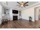 Spacious living room with fireplace and built-in shelving at 14206 Morningate St, Huntersville, NC 28078