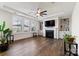 Spacious living room with fireplace and built-in shelving at 14206 Morningate St, Huntersville, NC 28078