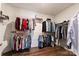 Spacious walk-in closet with ample hanging space and shelving at 14206 Morningate St, Huntersville, NC 28078