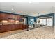 Kitchen sink with granite countertops, wooden cabinetry, stainless steel appliances and view into dining area at 1467 Kensington Park Ct, Hickory, NC 28602