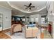 Bright living room with fireplace flowing into kitchen, designed for modern living and entertaining at 1467 Kensington Park Ct, Hickory, NC 28602