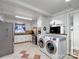 Kitchen with white cabinets, granite countertops, and appliances at 1500 Collier Ct, Charlotte, NC 28205