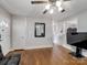 Hardwood floors, neutral walls, and a view into the kitchen at 1500 Collier Ct, Charlotte, NC 28205