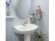 Small bathroom with pedestal sink and modern fixtures at 159 Kallie Loop, Mooresville, NC 28117