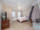 Spacious bedroom with a queen bed and plenty of natural light at 159 Kallie Loop, Mooresville, NC 28117