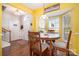 Cozy dining area with bay window and hardwood floors at 159 Kallie Loop, Mooresville, NC 28117