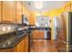 Kitchen with stainless steel appliances and granite countertops at 159 Kallie Loop, Mooresville, NC 28117