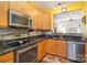 Kitchen with stainless steel appliances and granite countertops at 159 Kallie Loop, Mooresville, NC 28117