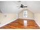 Bright bedroom with hardwood floors, dormer window and ceiling fan at 1610 Elkhart Cir, Gastonia, NC 28054