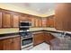 Kitchen with stainless steel appliances and granite countertops at 1610 Elkhart Cir, Gastonia, NC 28054