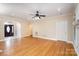 Spacious living room with hardwood floors and neutral colors at 1610 Elkhart Cir, Gastonia, NC 28054