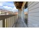 Private balcony with wooden deck and sliding glass door access at 1620 #G Arlyn Cir, Charlotte, NC 28213