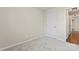 Bedroom with neutral walls, carpeting, and closet at 1620 #G Arlyn Cir, Charlotte, NC 28213