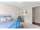 The bedroom features a bed, a window and an accent chair at 1620 #G Arlyn Cir # G, Charlotte, NC 28213