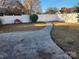 Backyard with stamped concrete walkway and privacy fence at 19 Todd Ne Dr, Concord, NC 28025