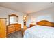 Comfortable bedroom with wooden furniture and view of backyard at 1957 Beth Haven Church Rd, Denver, NC 28037