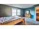 Spacious bedroom with wood dresser and neutral walls at 1957 Beth Haven Church Rd, Denver, NC 28037