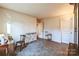 Small bedroom with simple wooden chair and flooring at 1957 Beth Haven Church Rd, Denver, NC 28037