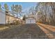 Detached double-door garage with gravel driveway at 1957 Beth Haven Church Rd, Denver, NC 28037