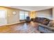 Living room with hardwood floors, comfy seating, and large windows at 1957 Beth Haven Church Rd, Denver, NC 28037