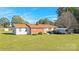 Ranch-style brick home with carport and spacious yard at 1995 Gastonia Hwy, Lincolnton, NC 28092