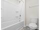 Bathroom features a shower/tub combo and toilet at 221 Wildflower Dr, Locust, NC 28097