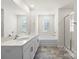 Bathroom boasts double vanity, bathtub, and shower at 221 Wildflower Dr, Locust, NC 28097