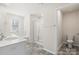 Modern bathroom with double vanity, shower, and toilet at 221 Wildflower Dr, Locust, NC 28097