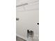 Bright laundry room with shelving and built-in storage at 221 Wildflower Dr, Locust, NC 28097