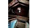 Unfinished attic with wooden beams and window at 2244 9Th Ne Ave, Hickory, NC 28601