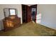 Bedroom with dresser, closet, and carpet at 2244 9Th Ne Ave, Hickory, NC 28601