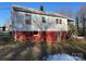 House with red brick base and wooden stairs at 2244 9Th Ne Ave, Hickory, NC 28601