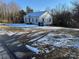 White house with yard, some snow on the ground at 2244 9Th Ne Ave, Hickory, NC 28601