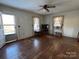 Simple living room featuring hardwood floors and windows at 2244 9Th Ne Ave, Hickory, NC 28601