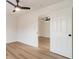 Bright bedroom with hardwood floors and access to another room at 2328 Sanders Ave, Charlotte, NC 28216