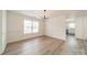 Bright dining room features hardwood floors and an open concept design at 2328 Sanders Ave, Charlotte, NC 28216