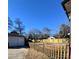 Private backyard with wooden fence at 300 S Thompson St, Shelby, NC 28150