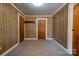 Spacious bedroom with wood-paneled walls and two closets at 304 Edel St, Kings Mountain, NC 28086