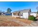 Side view of a white house with walkway and yard at 304 Edel St, Kings Mountain, NC 28086