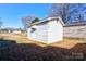 View of a white shed with a door and small awning at 304 Edel St, Kings Mountain, NC 28086