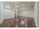 Large basement recreation room with hardwood floors at 4225 Nathaniel Glen Ct, Matthews, NC 28105