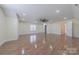 Spacious bedroom with hardwood floors and ceiling fan at 4225 Nathaniel Glen Ct, Matthews, NC 28105