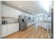 Spacious kitchen with stainless steel appliances and ample white cabinetry at 4225 Nathaniel Glen Ct, Matthews, NC 28105