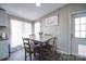 Small dining area with four chairs and lots of natural light at 427 Twin Oaks Rd, Statesville, NC 28625