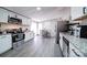 Modern kitchen with white cabinets and granite countertops at 427 Twin Oaks Rd, Statesville, NC 28625