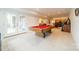 Basement with a pool table and plenty of space at 5218 Shadow Pond Ln, Charlotte, NC 28226